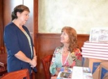 Lynda Neilsen and Gwen Stephenson receive Loveland 365 books Linda Neilsen and Gwen Stephenson receive Loveland 365 books